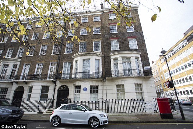 The man, believed to be a banker, fell from the fourth floor window of the exclusive 3million flat (far right) in Montagu Square in Marylebone, central London. He died after becoming impaled on the railings below